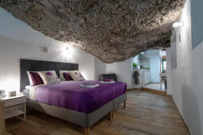 Romantic cave with big terrace overlooking the sea